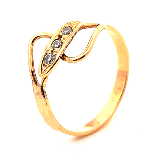 Anillo de oro 18k, piedras centrales, peso 1,31 grs, talla 9 1