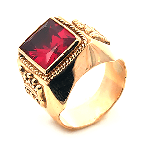 Anillo de oro 18k modelo sello con piedra roja central, peso 13,80 grs, talla 19