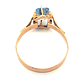 Anillo de oro 18k modelo chatón con piedra celeste, peso 1,90 grs, talla 16 - Miniatura 4